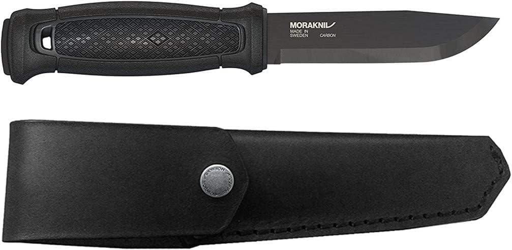Morakniv Garberg full tang outdoor knife being unboxed on a campsite table